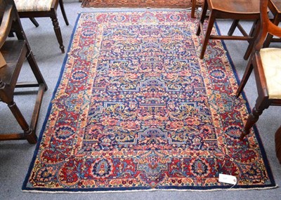 Lot 874 - Tabriz Rug, Persian Azerbaijan, The indigo floral field of allover design enclosed by blood red...