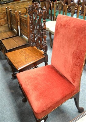 Lot 877 - A carved oak hall chair in 17th century style and an 18th century dining chair, recovered in...