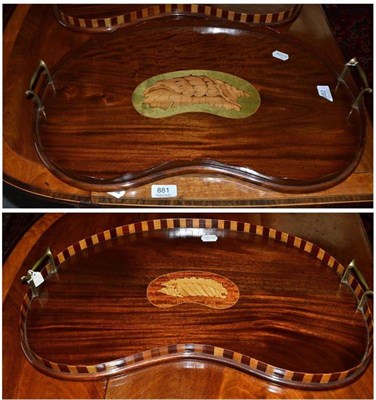 Lot 882 - Two mahogany kidney shaped trays, width 57cm each