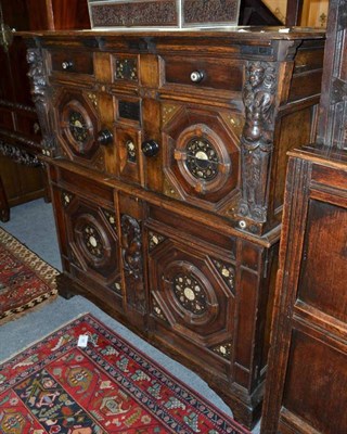 Lot 916 - A 17th century oak and snake wood cupboard, later adapted, width 118cm