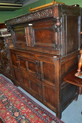 Lot 917 - A 17th century joined oak press cupboard, width 137cm