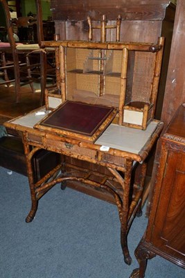 Lot 941 - An early 20th century bamboo writing table, width 84cm