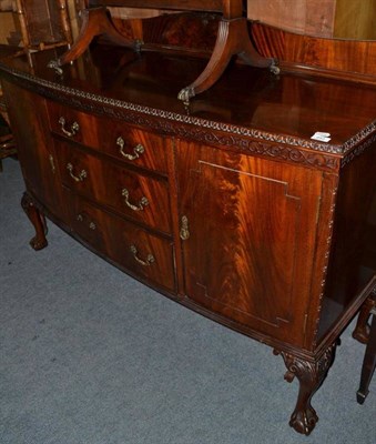 Lot 943 - An Edwardian mahogany bow fronted sideboard on claw and ball feet, width 151cm