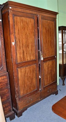 Lot 950 - A mahogany wardrobe, width 131cm