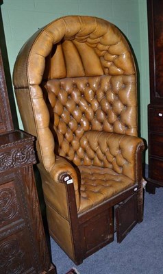 Lot 952 - A mahogany and brown button and close nailed porter's chair, height 160cm