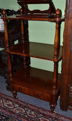 Lot 955 - A Victorian walnut three tier whatnot, height 115cm