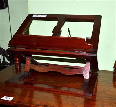 Lot 956 - A mahogany folding music stand, width 37cm