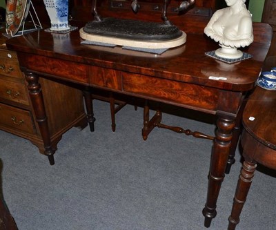 Lot 961 - A William IV mahogany serving table, fitted two drawers, width 136cm