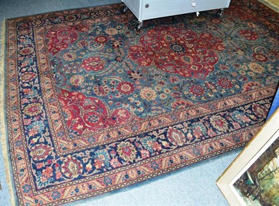 Lot 978 - Tabriz carpet, Persian Azerbaijan, the pale indigo field centred by a raspberry medallion...