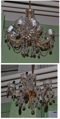 Lot 987 - Cut glass six branch chandelier with amethyst colours drops and an eight branch chandelier