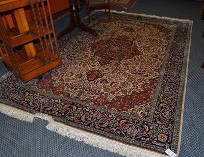 Lot 1003 - Kashmir Silk Carpet North West India The ivory field centred by a rust pole medallion surrounded by