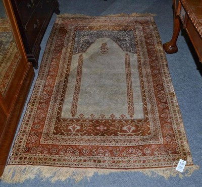 Lot 1008 - Anatolian Silk Prayer Rug, Probably BursaThe cream field with hanging lantern beneath the...