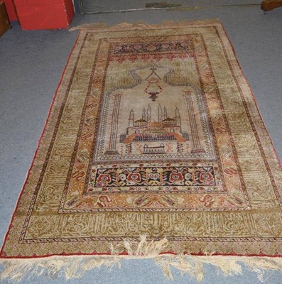 Lot 1011 - Anatolian Silk Prayer Rug, probably Bursa, the ivory field depicting an Ottoman mosque beneath...