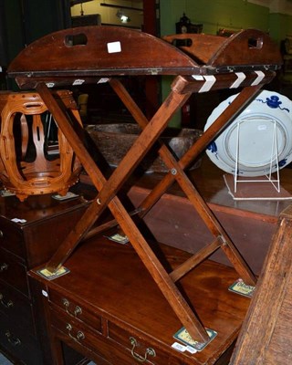 Lot 1016 - Mahogany campaign butlers tray on folding stand