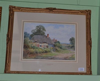 Lot 1153 - Henry Sylvester Stannard (1870- 1951) A thatched cottage and garden Signed, watercolour, 24cm...