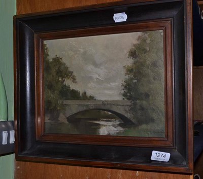 Lot 1274 - Continental School (early 20th century) A view of a river and bridge, indistinctly signed, oil...