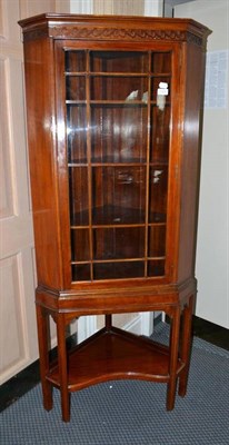 Lot 1324 - Edwardian mahogany free standing corner cupboard, height 169cm