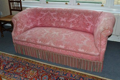 Lot 1330 - A Victorian settee upholstered in pink floral damask, width 177cm