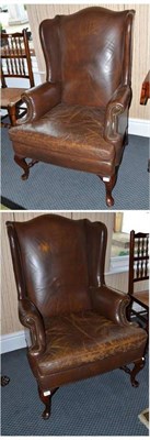 Lot 1331 - Pair of early 20th century Queen Anne style mahogany and leather wing chairs, width 80cm