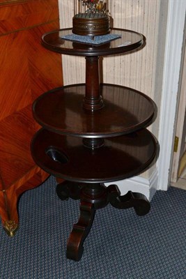 Lot 1338 - A mahogany circular three tier dumb waiter, height 96cm