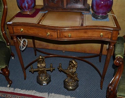 Lot 1345 - A yew wood serpentine two drawer writing table, width 93cm