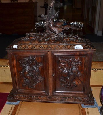 Lot 1346 - A late 19th/early 20th century carved lindenwood casket, 47cm wide