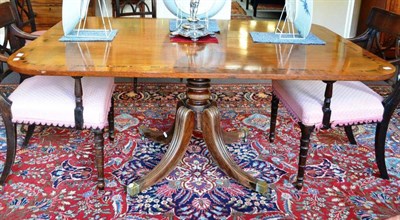 Lot 1347 - A late George III mahogany cross banded breakfast table, width 152cm