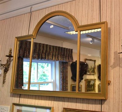 Lot 1364 - A gilt arched overmantel mirror, width 100cm