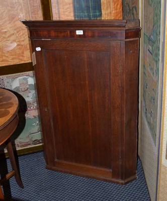 Lot 1375 - Oak hanging corner cupboard, circa 1800, height 104cm