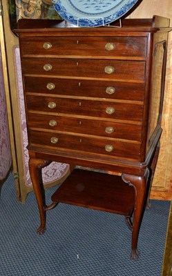 Lot 1378 - An Edwardian mahogany six drawer chest with gallery top, width 73cm