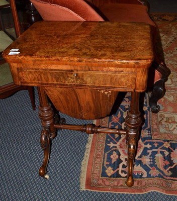 Lot 1386 - Mid Victorian burr walnut games and work table, with key and sundry contents, width 56cm