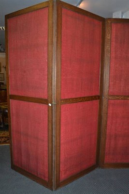 Lot 1396 - A large oak three fold dressing screen, height 214cm