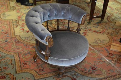 Lot 1398 - A Victorian walnut open armchair, upholstered in blue velvet