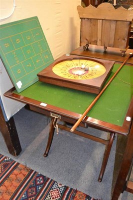 Lot 1422 - A folding mahogany games table, Roulette board and accessories