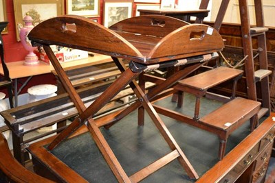 Lot 1427 - A mahogany butler's tray with brass fittings and folding stand, width 74cm