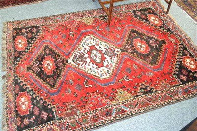 Lot 1432 - Kashgai Rug South West Persia, the blood red field with three stepped medallions, 166 by 125...