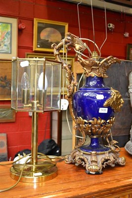 Lot 1438 - An early 20th century gilt metal ewer/table lamp, height 61cm and a modern brass three branch table