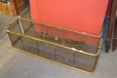 Lot 1440 - Two brass and wire fire fenders and irons