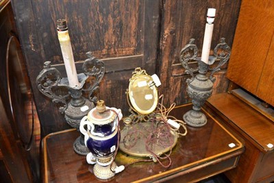 Lot 1449 - A Meissen blue ground table lamp with serpent handles, pair of spelter vases converted to lamps and