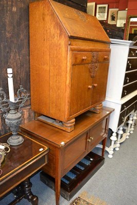 Lot 1450 - An Edwardian mahogany washstand, width 107cm and a 1940's oak bureau and a small wall hanging...