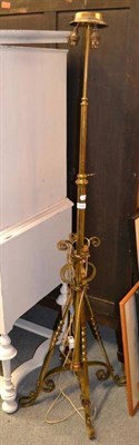 Lot 1452 - An early 20th century adjustable brass standard lamp, height 144cm