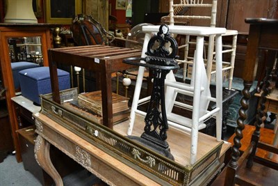 Lot 1465 - Cast iron stick stand with drip tray, brass fender, oak luggage stand and white painted step stool