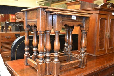 Lot 1473 - Set of three oak nesting tables, largest - 49cm wide