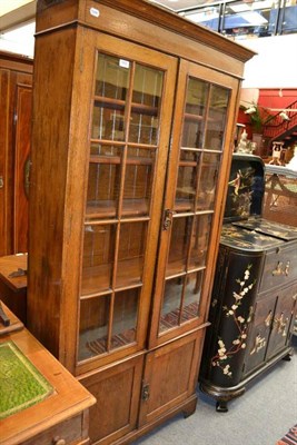 Lot 1482 - Edwardian pale oak bookcase, width 94cm