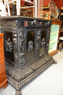 Lot 1485 - A 17th century style Italian ebonised cupboard, width 124cm Ex. Renishaw Hall