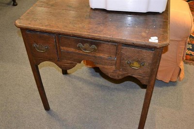 Lot 1536 - An 18th century joined oak lowboy, width 76cm