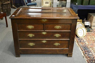 Lot 1547 - An 18th century joined oak chest, hinged lid and dummy drawers, width 117cm