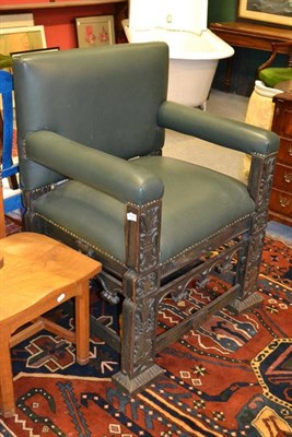 Lot 1557 - Part period oak and green leather throne armchair, width 77cm