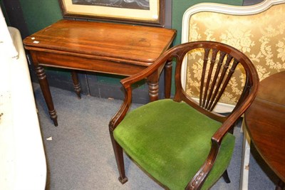 Lot 1564 - A Victorian mahogany fold over tea table, width 94cm and a mahogany carver chair, width 60cm