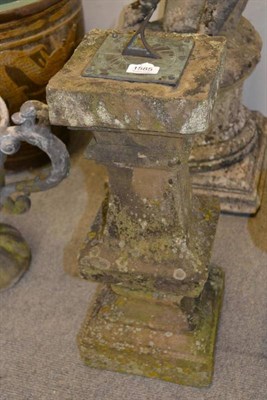 Lot 1585 - A small stone column set with a sun dial, height 57cm